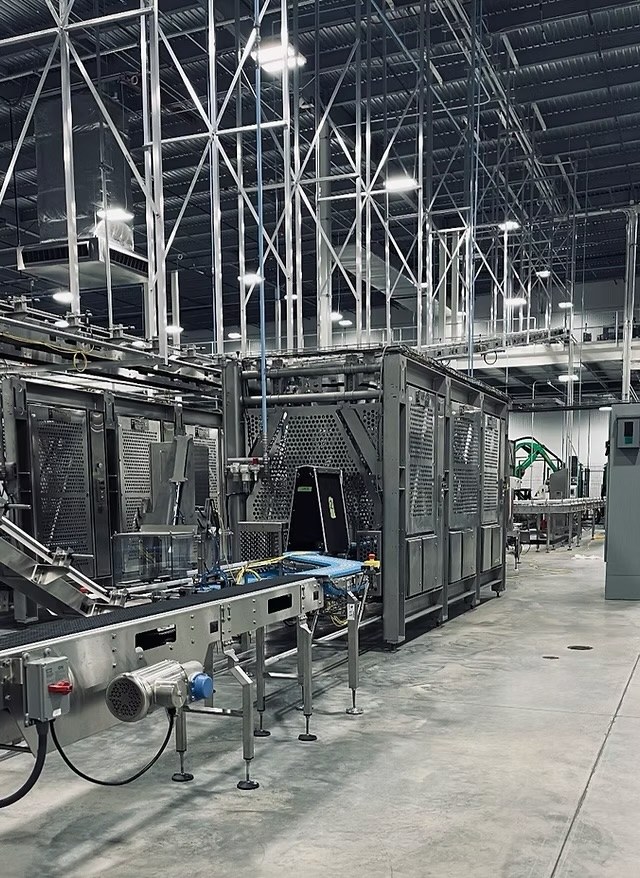 Food processing packaging line with stainless steel conveyors and motor connections